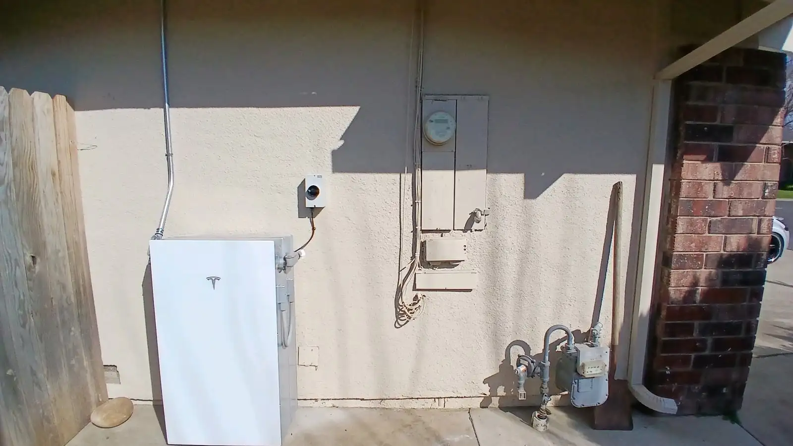 A Tesla Powerwall installed on the exterior wall of a Northern California home.