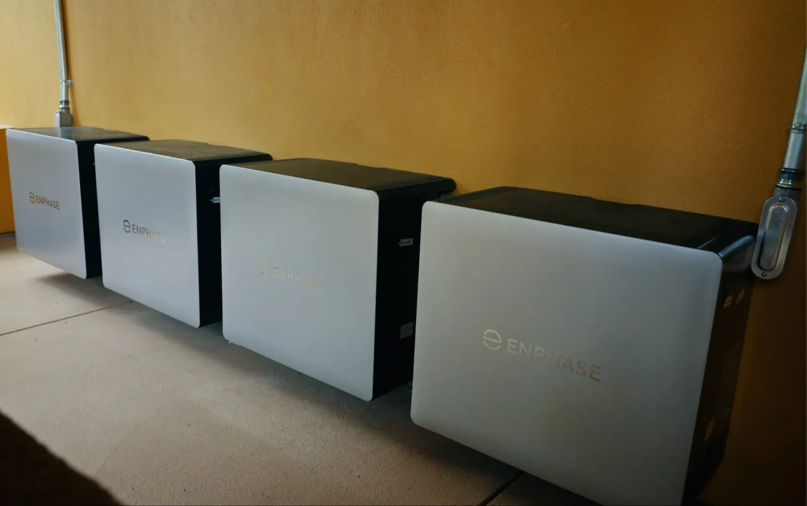 A row of four Enphase battery units installed by Westhaven Power on a Northern California home.